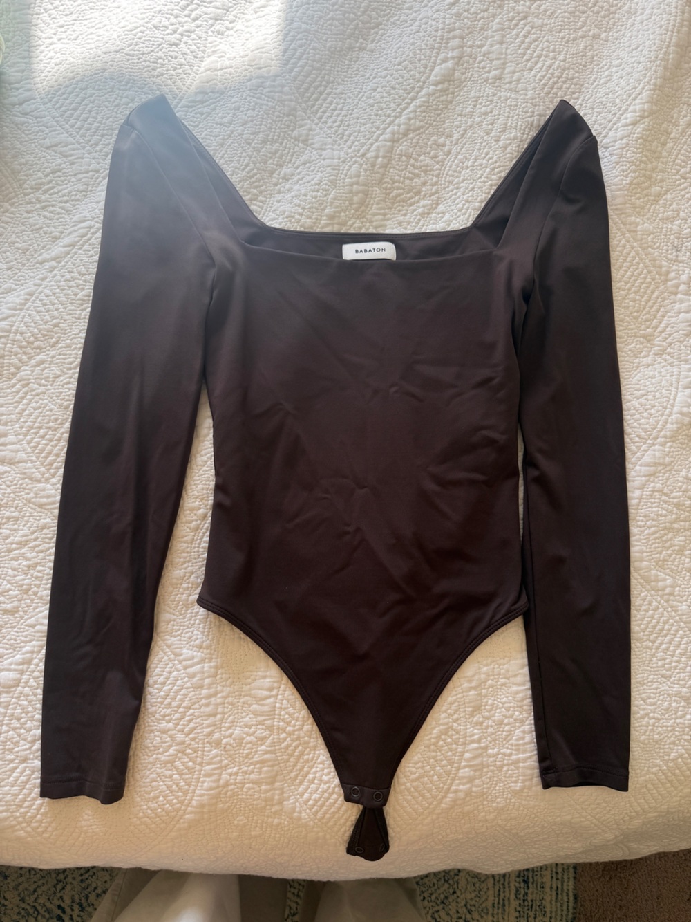 Babaton Long-Sleeve One-Piece Bodysuit in Dark Brown